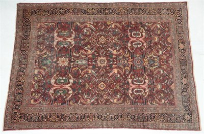 Lot 277 - Mahal Carpet West Iran, circa 1920 The fox brown field of large serrated leaves and flowerheads...