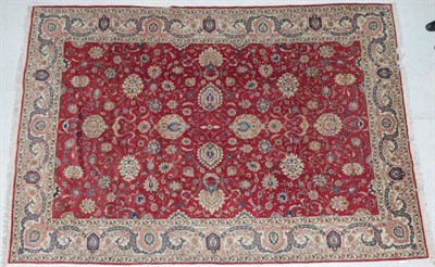 Lot 278 - Tabriz Carpet Iranian Azerbaijan, circa 1950 The blood red field with an allover design of...