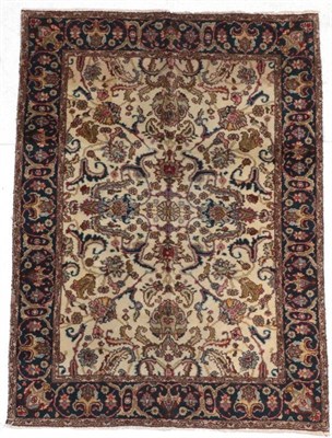 Lot 280 - Tabriz Rug Iranian Azerbaijan, circa 1950 The ivory field of leafy vines enclosed by leafy borders