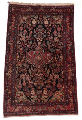 Lot 281 - Senneh Rug Iranian Kurdistan, circa 1950 The charcoal field centred by a terracotta medallion...