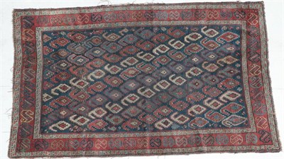 Lot 294 - Gendje Rug South Caucausus, late 19th century The indigo field of polychrome boteh enclosed by...