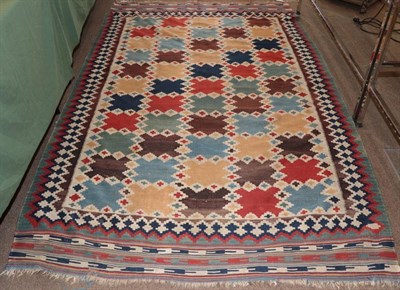 Lot 295 - Kashgai Kilim South West Iran, circa 1920 The polychrome compartmentalised field enclosed by...