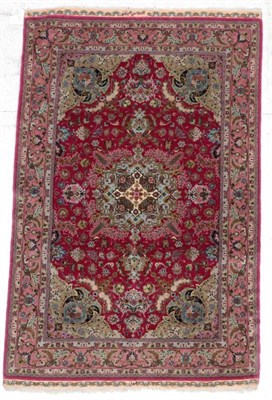 Lot 297 - Fine Tabriz Part Silk Signed Rug Iranian Azerbaijan, modern The raspberry field of scrolling...