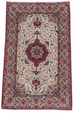 Lot 298 - Kashan Rug Central Iran, circa 1960 The ivory field with cusped medallion framed by spandrels,...