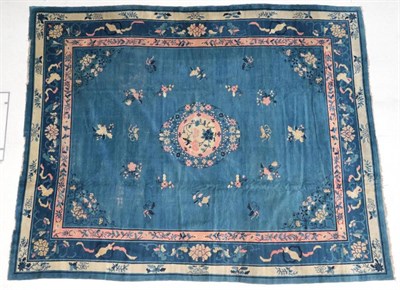 Lot 299 - Chinese Carpet, circa 1900 The sky blue field centred by a coral pink and ivory floral roundel...