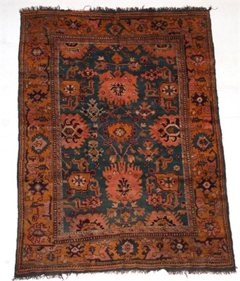 Lot 300 - Ushak Carpet  Central West Anatolian, circa 1900 The turquoise field of Harshang motifs and...