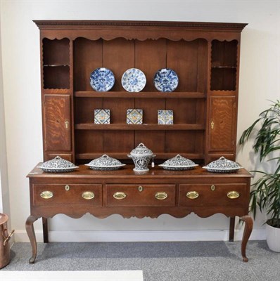 Lot 305 - A Late George III Oak and Mahogany Crossbanded Dresser and Rack, the dentil cornice above a...