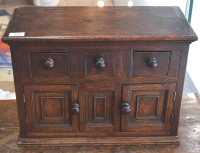 Lot 308 - A George III Miniature Oak Dresser Base, late 18th century, with three small drawers above two...