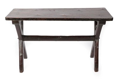 Lot 317 - A Victorian Stained Pine Tavern Table, the plank top on chamfered X shaped supports united by a...