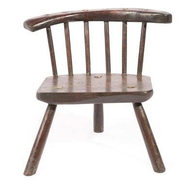 Lot 324 - A Child's Primitive Stick Back Chair, the curved top rail above a plain seat and three splayed...