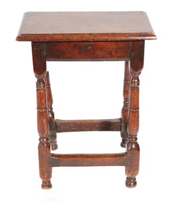 Lot 326 - ^ An 18th Century Oak Joint Stool, the later top above a moulded apron, on turned spindle...