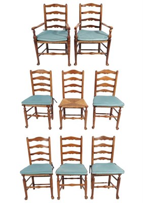 Lot 329 - ^ A Harlequin Set of Eight Ash Ladder-Back and Rush-Seated Dining Chairs, mid 19th century,...