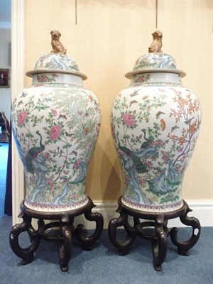 Lot 274 - A Pair of Chinese Porcelain Baluster Jars and Covers, in 18th century style, painted in famille...