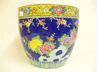 Lot 275 - A Chinese Porcelain Jardiniere, late 19th/20th century, painted in famille rose enamels with exotic