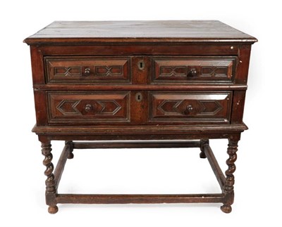 Lot 344 - A 17th Century Oak Chest on Stand, the moulded top above conforming two-as-one geometric...