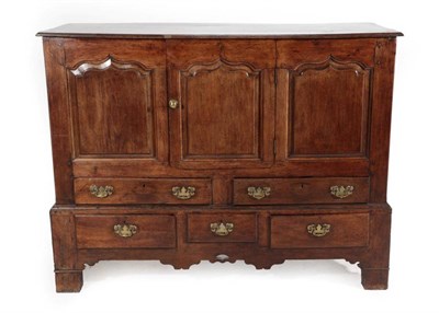 Lot 358 - A Joined Oak Chest, 18th century and adapted, with a central cupboard door flanked by...