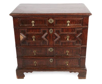 Lot 361 - ^ A Late 17th Century Oak Chest of Drawers, the moulded top above four long geometric moulded...