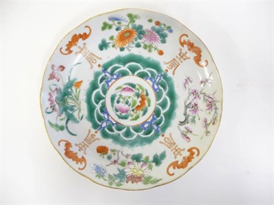 Lot 277 - A Chinese Porcelain Saucer Dish, 19th century, painted in famille rose enamels with a central...