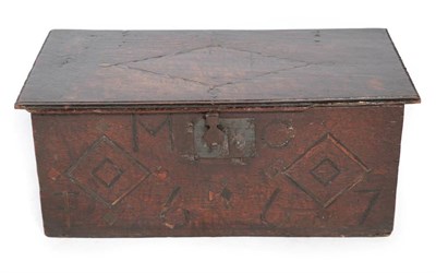 Lot 363 - ^ A 17th Century Oak Bible Box, dated 1667 and initialled MO, the moulded hinged lid carved...