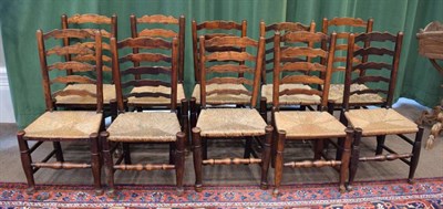 Lot 374 - A Harlequin Seat of Ten Ash and Elm Ladderback Chairs, Cheshire region, mid 19th century, the...