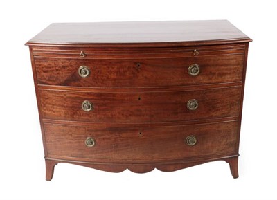 Lot 381 - {} A George III Mahogany Bowfront Chest, late 18th century, the moulded top above a pull-out...