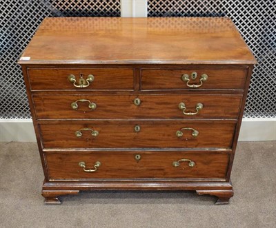 Lot 383 - ~ A George III Mahogany Straight Front Chest of Drawers, late 18th century, the moulded top...