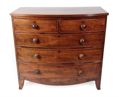 Lot 384 - ~ A Regency Mahogany Bowfront Front Chest of Drawers, early 19th century, the moulded top above two