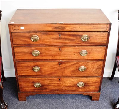 Lot 385 - ~ A Regency Mahogany Straight Front Chest of Drawers, early 19th century, of four graduated drawers