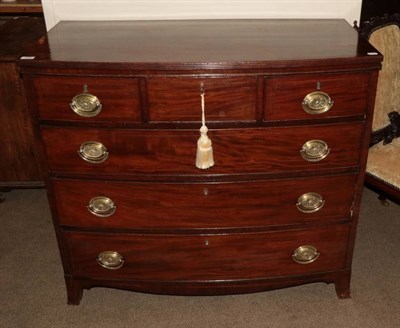 Lot 390 - A Late George III Mahogany and Boxwood Strung Bowfront Chest of Drawers, early 19th century,...