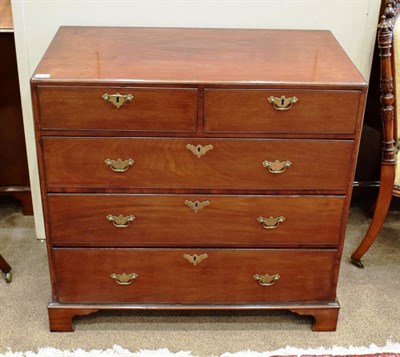 Lot 392 - A George III Mahogany Straight Front Chest of Drawers, late 18th century, the moulded top above two