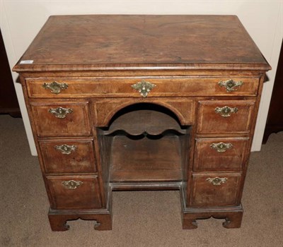 Lot 395 - A George I Walnut and Feather Banded Kneehole Dressing Table, early 18th century, the quarter...