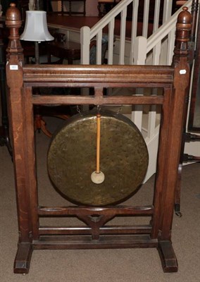 Lot 401 - An Oak Dinner Gong, circa 1890, the square chamfered frame with acorn shaped finials above a...