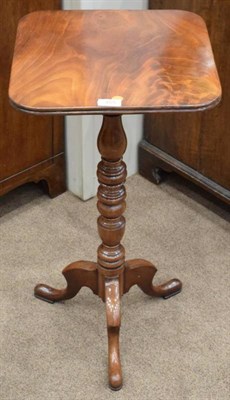 Lot 405 - {} A Late George III Mahogany Reading Table, early 19th century, the octagonal shaped top with rest