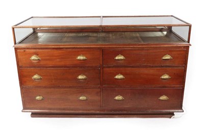 Lot 410 - A Late Victorian Mahogany Shop Display Cabinet, circa 1900, in two sections, the glazed counter top