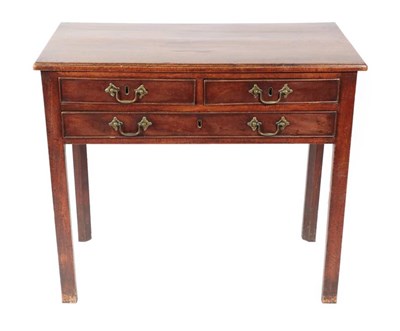 Lot 415 - ~ A George III Mahogany Three-Drawer Writing Table, late 18th century, of rectangular form with...