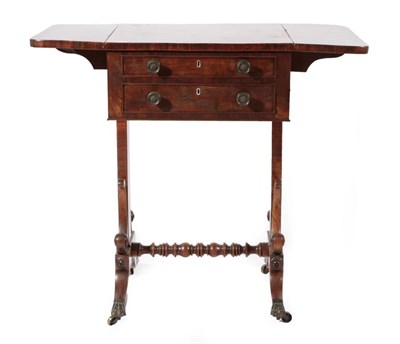 Lot 421 - ~ A Regency Mahogany and Crossbanded Writing Table, early 19th century, with two rounded drop...