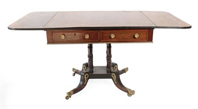 Lot 425 - A Regency Rosewood, Ebony Strung and Gilt Metal Mounted Sofa Table, early 19th century, with...