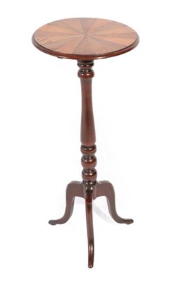 Lot 430 - ^ A Late George III Mahogany Fliptop Tripod Table, early 19th century, the moulded circular top...