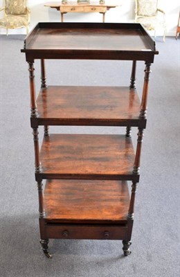 Lot 432 - ^ A Regency Rosewood Whatnot, early 19th century, of four tier form with three-quarter gallery...