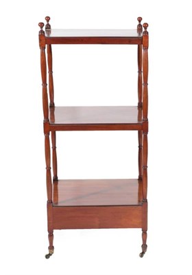 Lot 449 - ~ A Mahogany Three-Tier Whatnot, 2nd quarter 19th century, of rectangular form with turned...