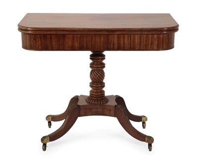 Lot 450 - ~ A Mahogany Foldover Tea Table, circa 1820, with pivoting hinged top above a plain frieze, on...