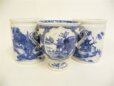 Lot 286 - A Pair of Chinese Blue and White Export Porcelain Jars, circa 1790, each of plain cylindrical form