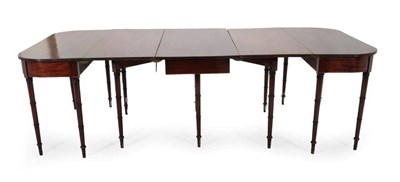 Lot 467 - A Late George III Mahogany D End Dining Table, early 19th century, in three sections with two...