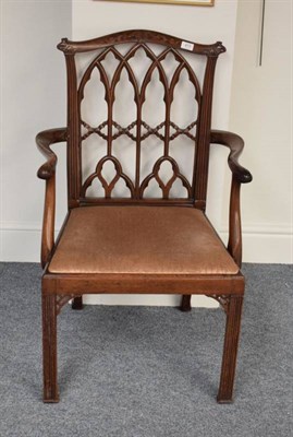 Lot 473 - A George III Style Carved Mahogany Armchair, the carved top rail above a gothic shaped splat...