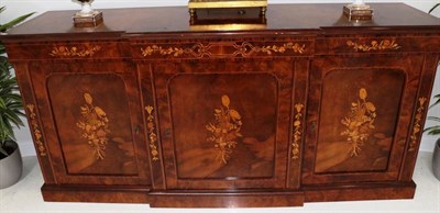 Lot 484 - A Figured Walnut, Crossbanded and Marquetry Inlaid Breakfront Sideboard, 20th century, with...