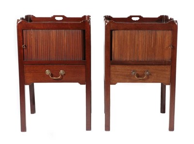 Lot 490 - ~ A Pair of George III Style Mahogany Tambour Front Bedside Tables, modern, the galleried tops...