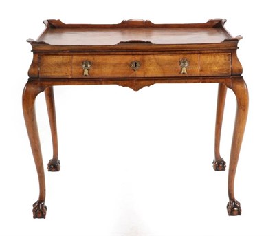 Lot 498 - A 1920's Walnut Side Table, the moulded top above a long frieze drawer, on cabriole legs with...