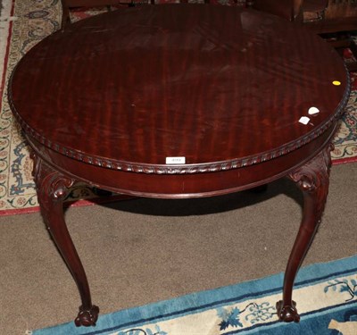 Lot 499 - A Carved Mahogany Circular Centre Table, early 20th century, the plain frieze on acanthus...