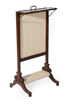 Lot 507 - {} A William IV Rosewood Firescreen, in the manner of Gillows, 2nd quarter 19th century, with...