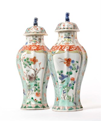 Lot 292 - A Pair of Chinese Porcelain Vases and Covers, Kangxi (1662-1722), of ogee section baluster form...